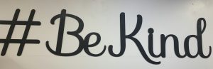 #BeKind painted on the wall