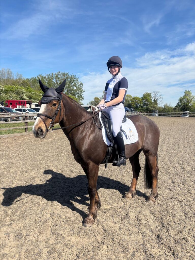 Student sat on horse